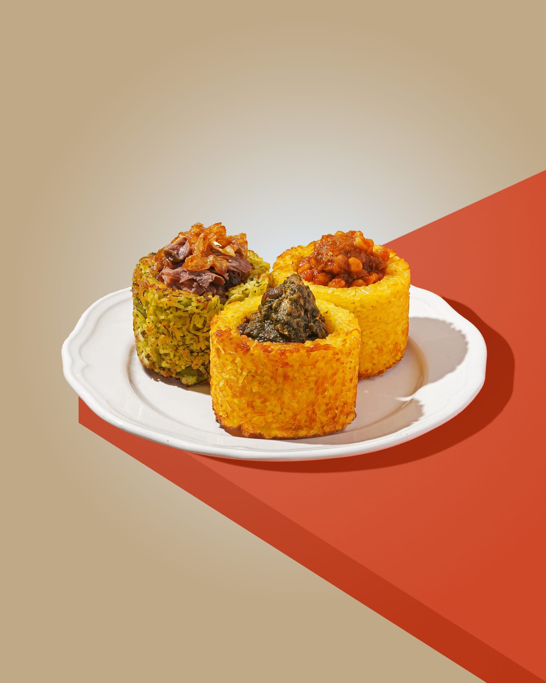 SHĀZDEH Mix — three saffron rice crowns filled with khoresh